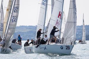 Howth Yacht Club, Co. Dublin, Ireland; Monday 26th August 2013: Tim Healy's Helly Hansen from Newport, Rhode Island on day one of the BMW J24 World Championships at Howth Yacht Club where 40 crews from ten nations are competing on the course area between Ireland's Eye and Lambay Island. photo copyright David Branigan/Oceansport http://www.oceansport.ie/ taken at  and featuring the  class