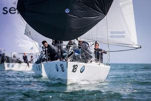 Howth Yacht Club, Co. Dublin, Ireland; Monday 26th August 2013: The Italian Marine team in action on La Superba during the opening race of the BMW J24 World Championships at Howth Yacht Club yesterday (Monday). photo copyright David Branigan/Oceansport http://www.oceansport.ie/ taken at  and featuring the  class