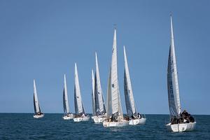 Howth Yacht Club, Co. Dublin, Ireland; Monday 26th August 2013: Racing started with light conditions for day one of the BMW J24 World Championships at Howth Yacht Club where 40 crews from ten nations are competing on the course area between Ireland's Eye and Lambay Island. photo copyright David Branigan/Oceansport http://www.oceansport.ie/ taken at  and featuring the  class