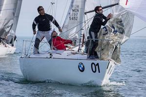 Howth Yacht Club, Co. Dublin, Ireland; Tuesday 27th August 2013: Defending champion Mauricio Santa Cruz off Howth on day two of the BMW J24 World Championships before racing was abandoned due to lack of wind.  The programme will continue for the rest of the week until Friday's final when fresher conditions have been forecast. photo copyright David Branigan/Oceansport http://www.oceansport.ie/ taken at  and featuring the  class