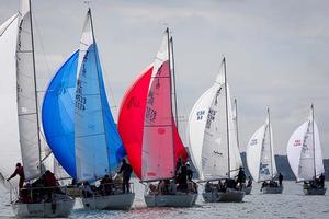 Howth Yacht Club, Co. Dublin, Ireland; Tuesday 27th August 2013: Fleet racing off Howth on day two of the BMW J24 World Championships before racing was abandoned due to lack of wind.  The programme will continue for the rest of the week until Friday's final when fresher conditions have been forecast. photo copyright David Branigan/Oceansport http://www.oceansport.ie/ taken at  and featuring the  class