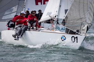 Howth Yacht Club, Co. Dublin, Ireland; Wednesday 28th August 2013: Defending world champion Mauricio Santa Cruz from Rio de Janeiro and his crew on Bruschetta who took the overall lead of the BMW J24 World Championships at Howth Yacht Club. photo copyright David Branigan/Oceansport http://www.oceansport.ie/ taken at  and featuring the  class