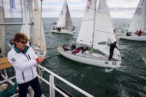 Howth Yacht Club, Co. Dublin, Ireland; Thursday 29th August 2013: Race Officer Judith Malcolm signals the start of a race during the penultimate day at the BMW J24 World Championships at Howth Yacht Club where 40 boats from ten nations are competing. photo copyright David Branigan/Oceansport http://www.oceansport.ie/ taken at  and featuring the  class