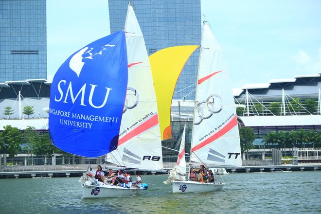 Boat on Spinnaker with SMU flaying high  © Howie Choo