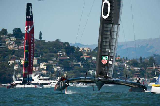 Oracle Team USA and Emirates Team New Zealand approach the start box for race six on day four of the America’s Cup 34. 12/9/2013 © Chris Cameron/ETNZ http://www.chriscameron.co.nz