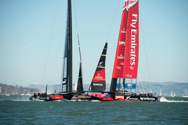 Emirates Team New Zealand ducks Oracle Team USA just before the top mark in race ten on day six of America’s Cup 34. 15/9/2013 © Chris Cameron/ETNZ http://www.chriscameron.co.nz
