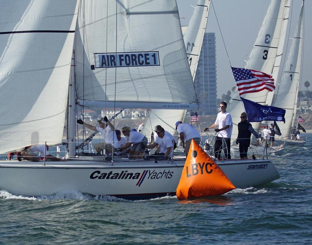 U.S. Air Force Team 1 lead at the first mark on their way to a win in the third race of the 2013 Patriot Regatta. They took second place in the regatta on a tie-breaker with U.S. Marine Corps Team 1. photo copyright Rick Roberts taken at  and featuring the  class