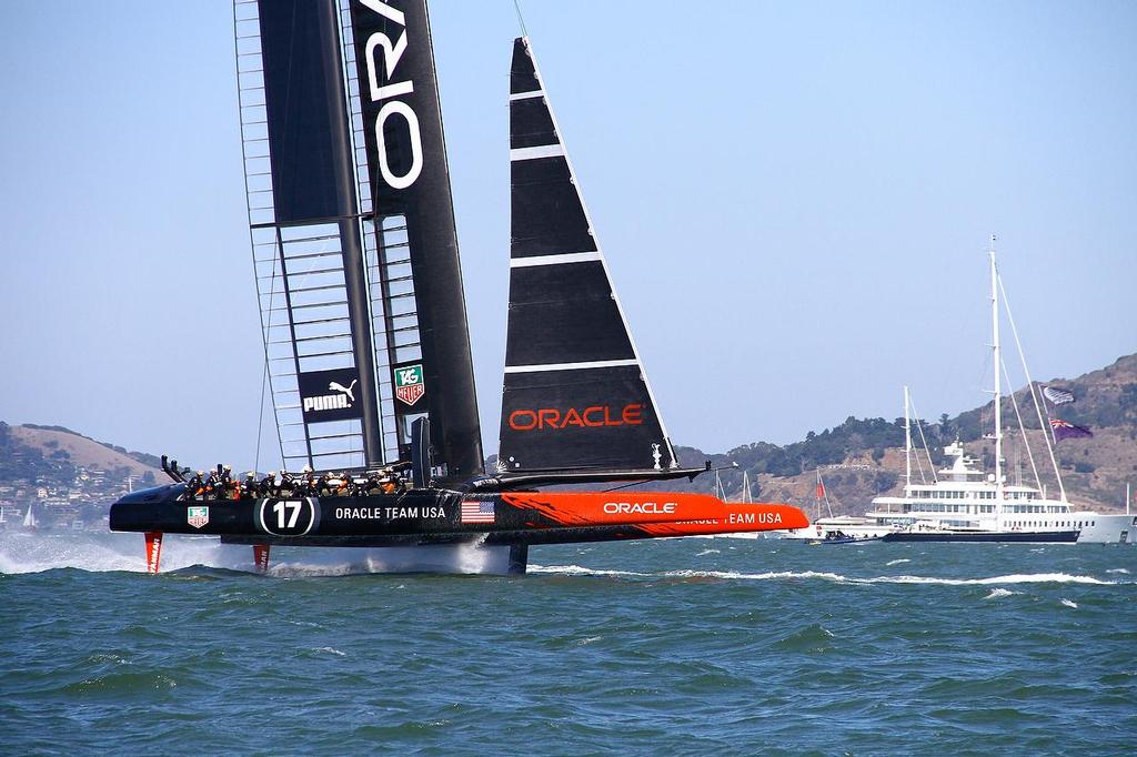 Oracle Team USA v Emirates Team New Zealand. America's Cup Day 5 San Francisco. Oracle Team USA rounds Mark 1, Race 9 with Larry Ellison's Rising Sun in the background photo copyright Richard Gladwell www.photosport.co.nz taken at  and featuring the  class