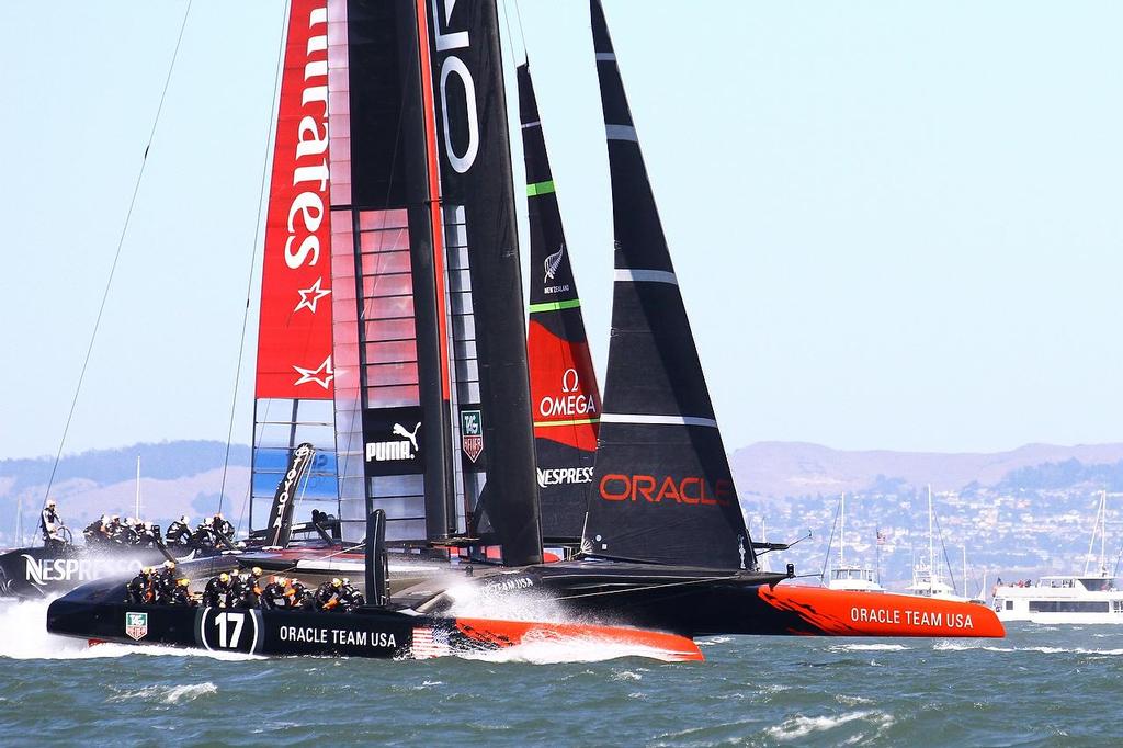 Oracle Team USA v Emirates Team New Zealand. America's Cup Day 6 San Francisco. Oracle Team USA digs in allowing Emirates Team NZ to claim the inside space at Mark 1 in race 10 - a moment Jimmy Spithill later said was critical to the outcome of the race photo copyright Richard Gladwell www.photosport.co.nz taken at  and featuring the  class