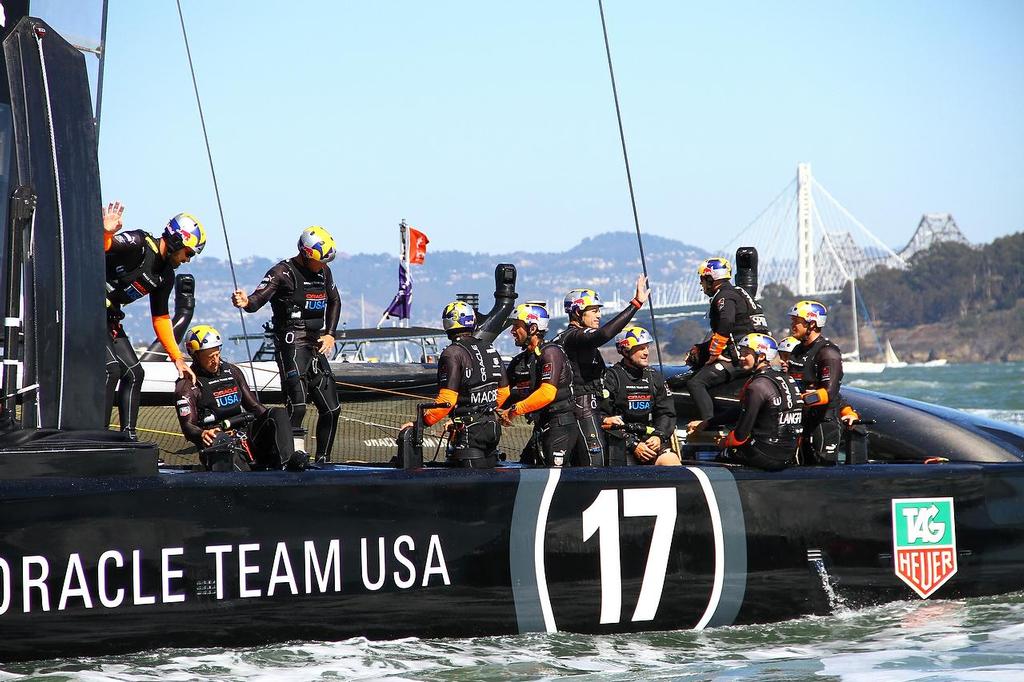 Oracle Team USA v Emirates Team New Zealand. America's Cup Day 6 San Francisco. Oracle Team USA crew acknowledge their fans at the end of race 10 photo copyright Richard Gladwell www.photosport.co.nz taken at  and featuring the  class