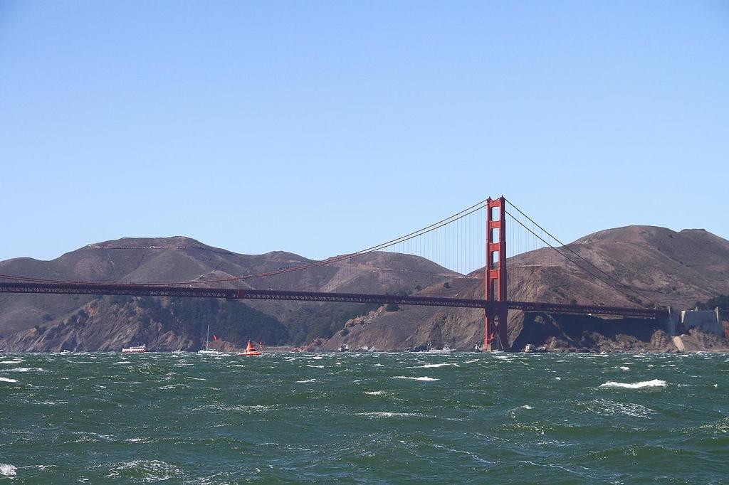 Oracle Team USA v Emirates Team New Zealand. America's Cup Day 7 San Francisco. Golden Gate Bridge towers over the race course after the abandonment of racing on Day 7 photo copyright Richard Gladwell www.photosport.co.nz taken at  and featuring the  class