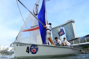 Team Singapore Justin Liu rounding the mark photo copyright Howie Choo taken at  and featuring the  class