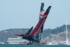 Emirates Team New Zealand gets close to capsizing when hydraulics failed to push the wing through on a tack. Oracle Team USA take the lead on the beat. Race eight on day five of the America's Cup 34. 14/9/2013 photo copyright Chris Cameron/ETNZ http://www.chriscameron.co.nz taken at  and featuring the  class