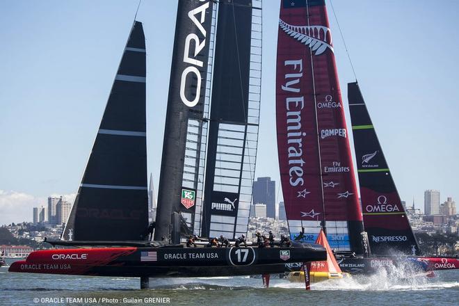 Oracle team USA and Emirates team NewZealand in action © Oracle Team USA http://www.oracleteamusa.com