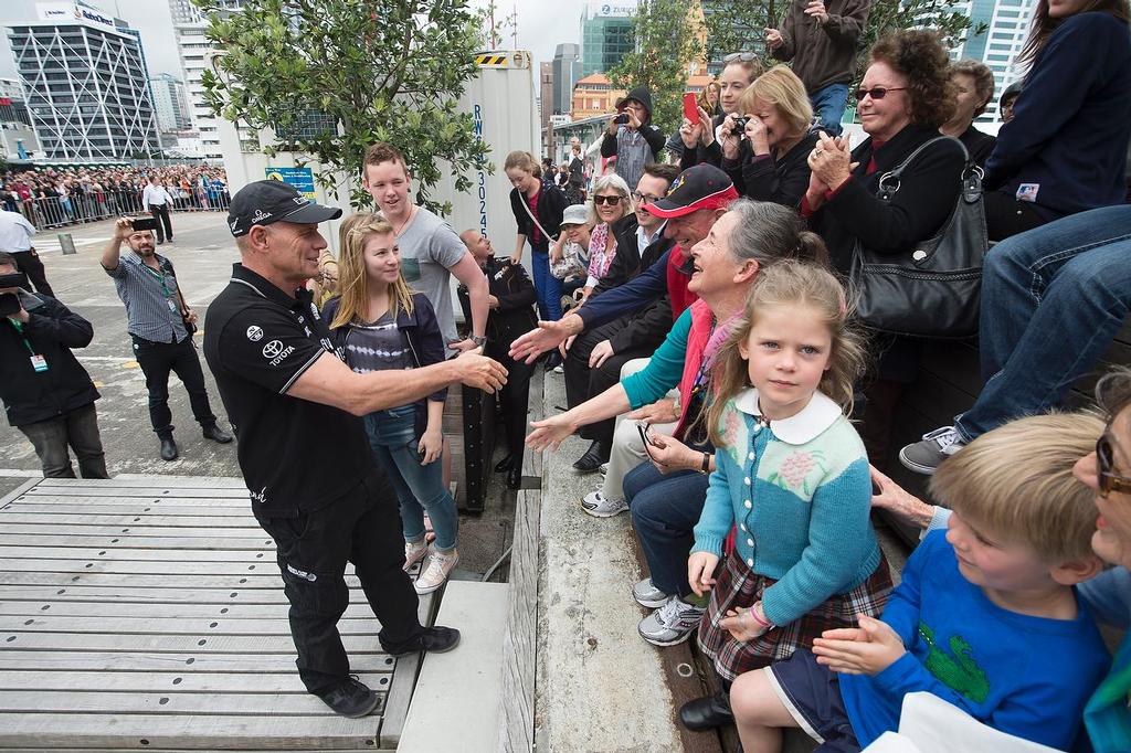 Emirates Team New Zealand welcome home event in Auckland. Grant Dalton greets fans at the entrance to Shed 10. 4/10/2013 © Chris Cameron/ETNZ http://www.chriscameron.co.nz