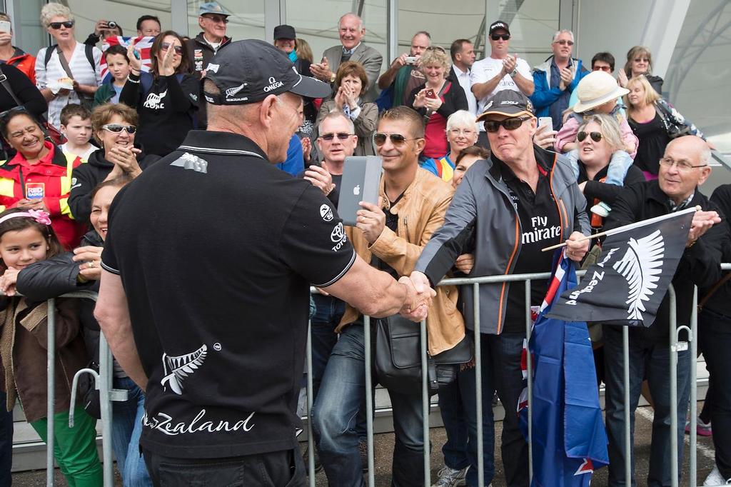 Emirates Team New Zealand welcome home event in Auckland. Grant Dalton greets fans at the entrance to Shed 10. 4/10/2013 © Chris Cameron/ETNZ http://www.chriscameron.co.nz