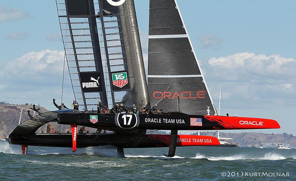 Oracle Team USA foiling towards the end of the 2013 America&rsquo;s Cup - Day 15 photo copyright Kurt Molnar taken at  and featuring the  class