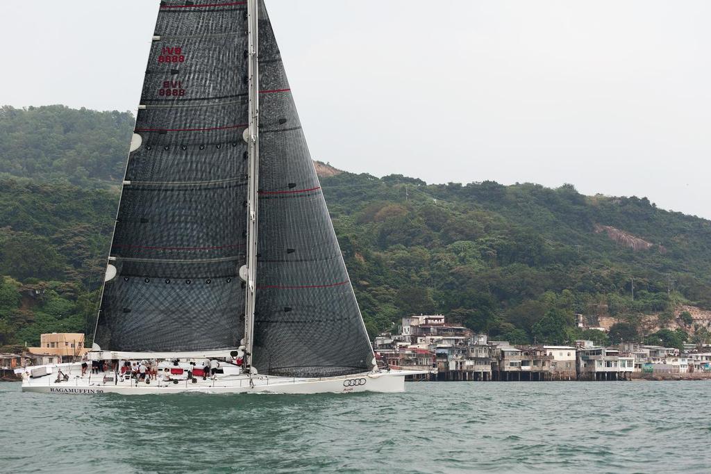 VNR13 0442 - Audi Hong Kong - Vietnam Race 2013. Ragamuffin 90 leads the fleet out of HK harbour ©  RHKYC/Guy Nowell http://www.guynowell.com/