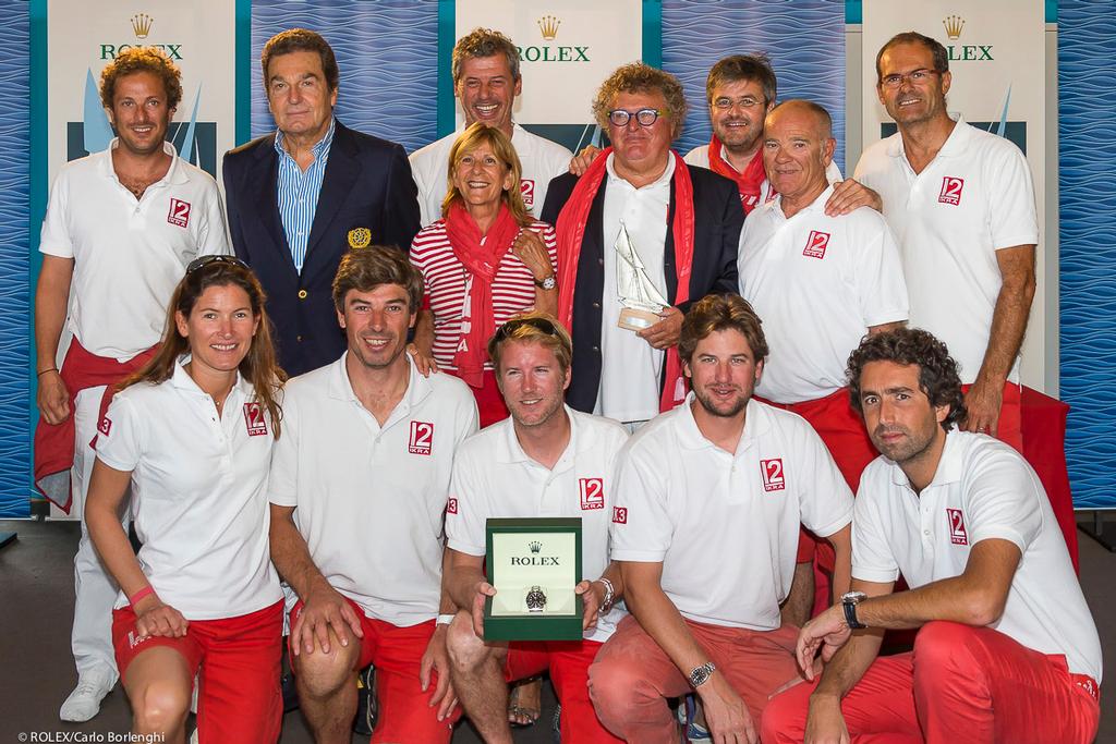 Prizegiving ceremony.<br />
Philippe Schaeffer, General Manager of Rolex France, awards a Rolex Submariner Date and the Rolex Trophy to IKRA ©  Rolex / Carlo Borlenghi http://www.carloborlenghi.net