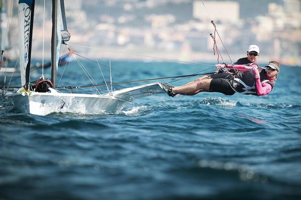 Alex Maloney and Molly Meech practicing ahead of their win in the 2013 49erFX World Championships © SW