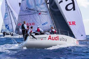 Porto Rotondo, 20/09/13 Audi Sailing Series Melges 32 2013 World Championship Melges 32 Audi Ultra Giacomel
 photo copyright BPSE/Studio Borlenghi/Francesco Ferri taken at  and featuring the  class