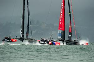 Emirates Team New Zealand and Oracle Team USA in the restart for race 13. The 1st attempt was called off after the 40 minute time limit was reached. America's Cup 34. 20/9/2013 photo copyright Chris Cameron/ETNZ http://www.chriscameron.co.nz taken at  and featuring the  class