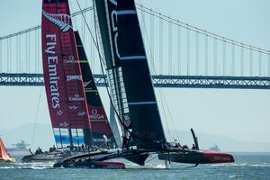 Oracle Team USA round the bottom mark ahead of Emirates Team New Zealand in race 16 on day 13 of America's Cup 34. 23/9/2013 photo copyright Chris Cameron/ETNZ http://www.chriscameron.co.nz taken at  and featuring the  class