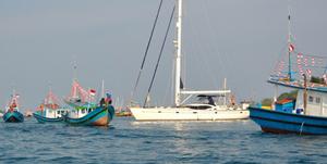 Curious & fishing boats - Oyster World Rally photo copyright Oyster 56, Dreams Come True taken at  and featuring the  class