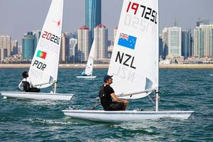 Saunders (NZL) Lima (POR) Laser - 2013 ISAF Sailing World Cup Qingdao Day 5 photo copyright ISAF  taken at  and featuring the  class