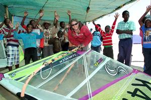 Zara Davis with children in Nambia photo copyright  Weymouth Speed Week taken at  and featuring the  class