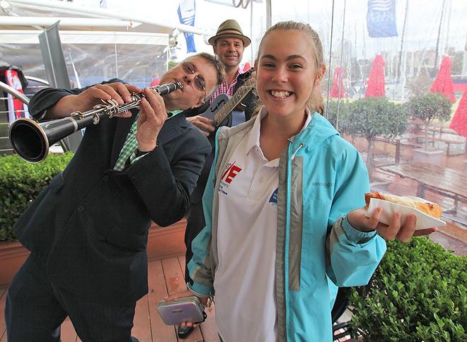 Freshly back from the Etchells Nationals, Tiana Whittey appreciated the band and the ham, cheese croissants. - 2013 Beneteau Cup ©  John Curnow