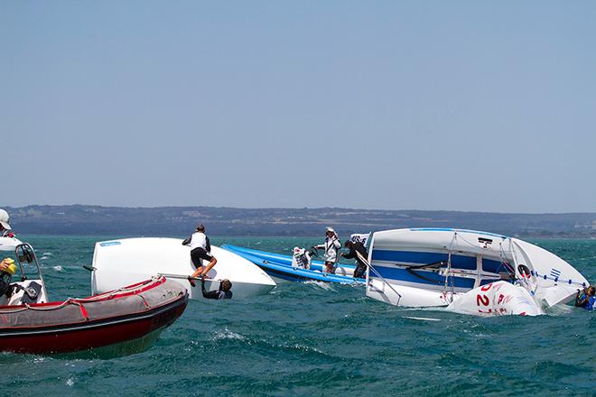 All hands on deck to assist the young crews. ©  Alex McKinnon Photography http://www.alexmckinnonphotography.com