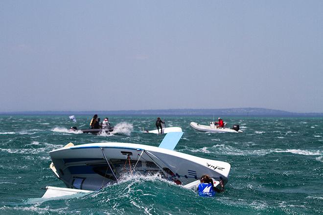 Many that righted their capsized craft just watched roll over once more and then once more again.... ©  Alex McKinnon Photography http://www.alexmckinnonphotography.com