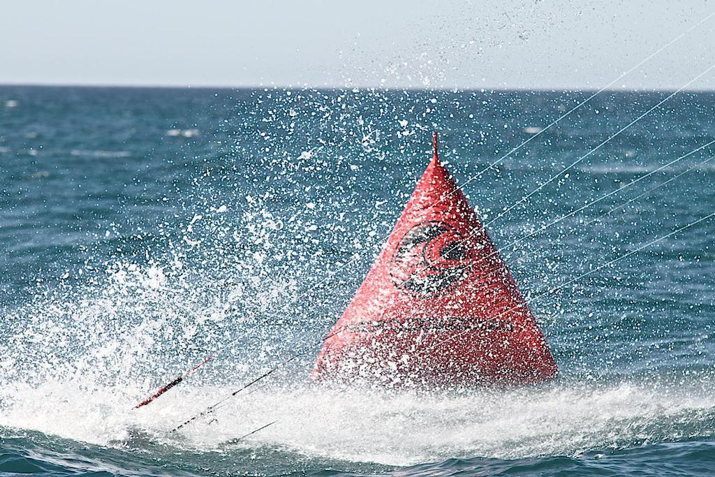 Guy Kane, dragged over the line to finish a well deserved sixth place overall photo copyright Bernie Kaaks taken at  and featuring the  class