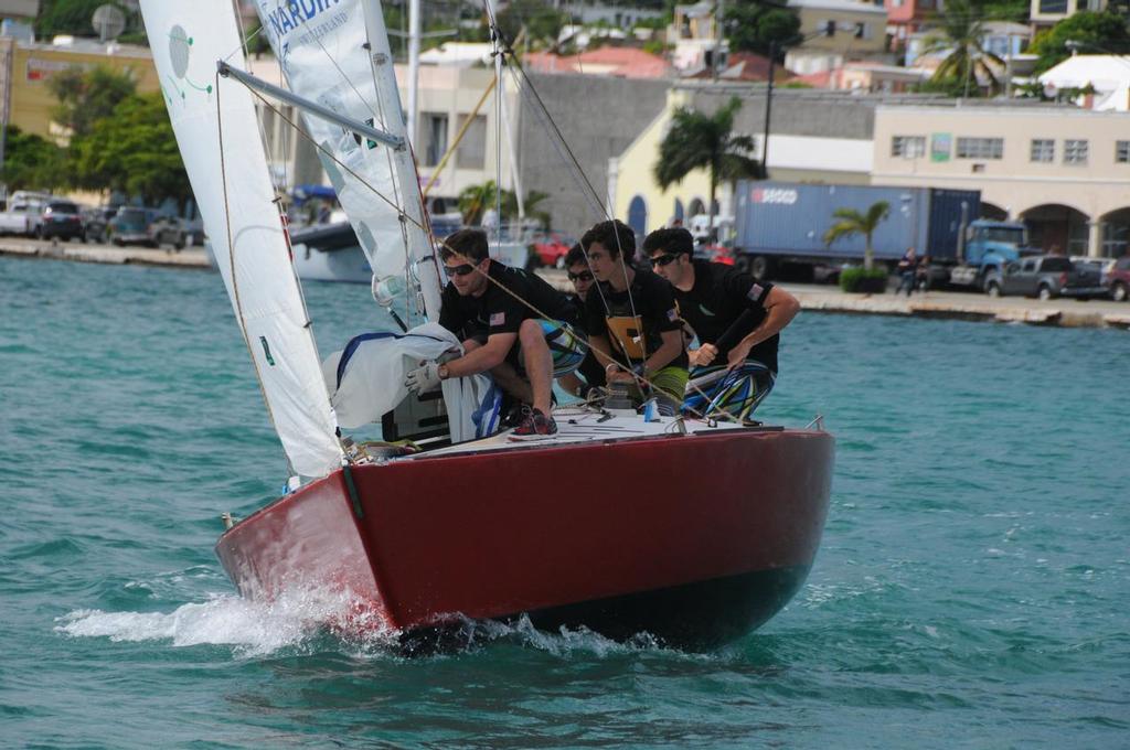 The USA’s Chris Poole and team race hard downwind to get in front of their opponent. © Dean Barnes