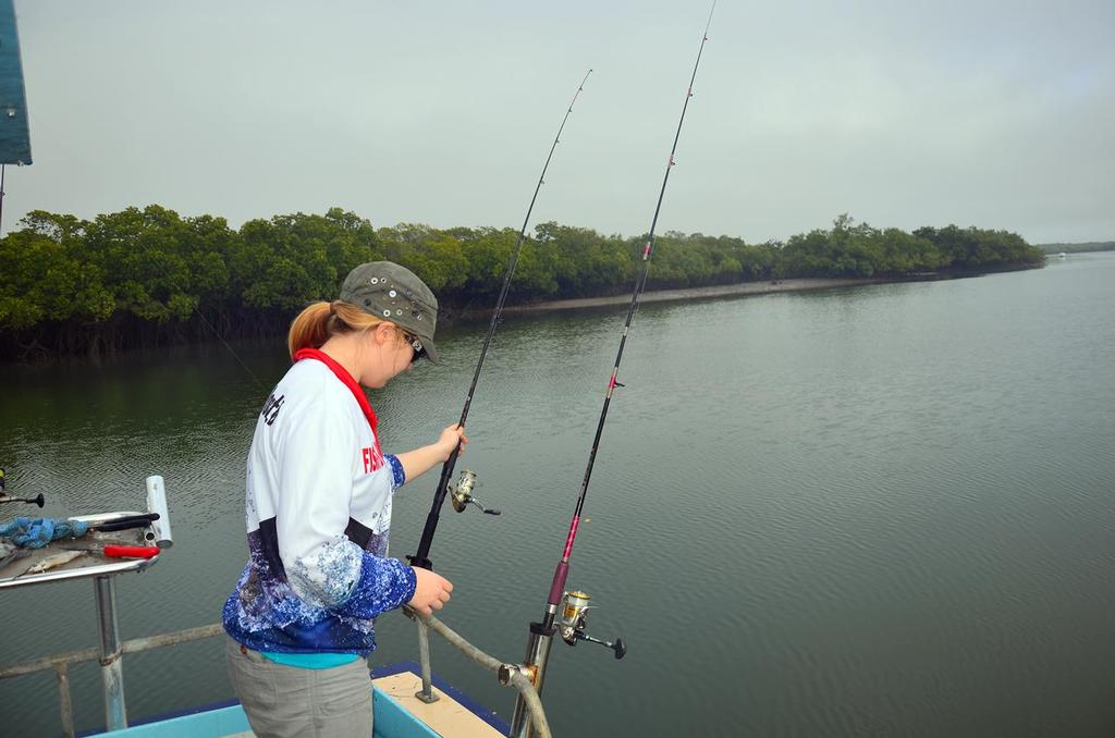 The author's wife Alanna checking the rods out the back of the Jez and waiting for the dusk bite. © Lee Brake