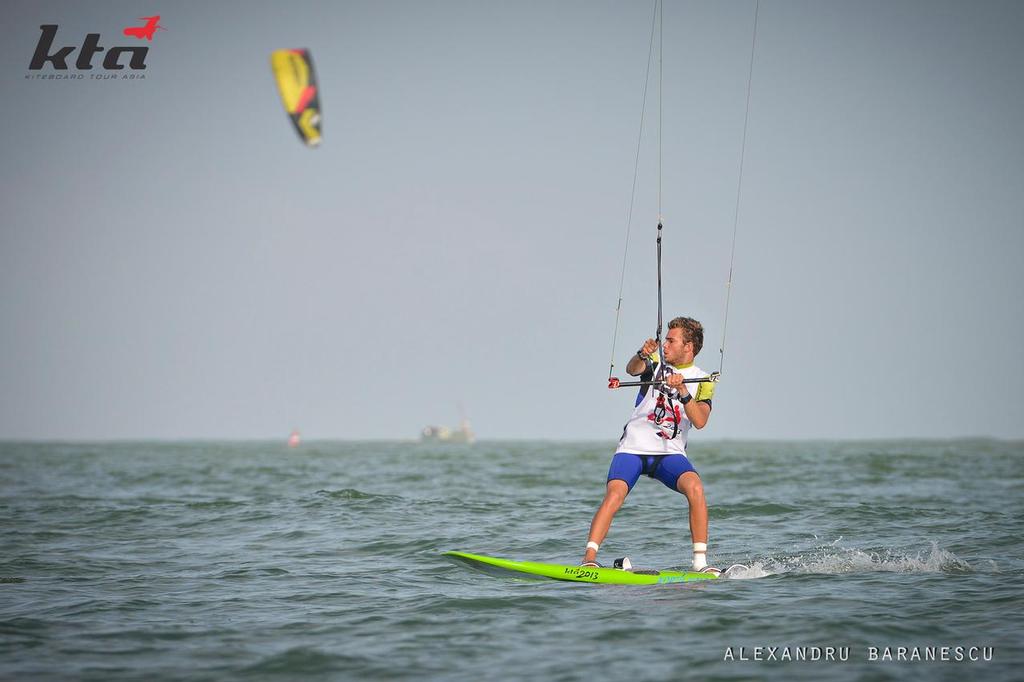 Action during day five of the IKA Kiteboard Race World Championship 2013 on November 24, 2013 at King Bay Qionghai, China. Photo by Alexandru Baranescu / KTA photo copyright  Icarus Sailing Media http://www.icarussailingmedia.com/ taken at  and featuring the  class