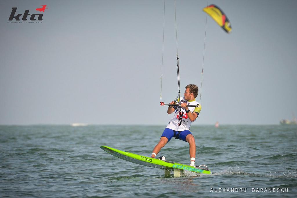 Action during day five of the IKA Kiteboard Race World Championship 2013 on November 24, 2013 at King Bay Qionghai, China. Photo by Alexandru Baranescu / KTA photo copyright  Icarus Sailing Media http://www.icarussailingmedia.com/ taken at  and featuring the  class