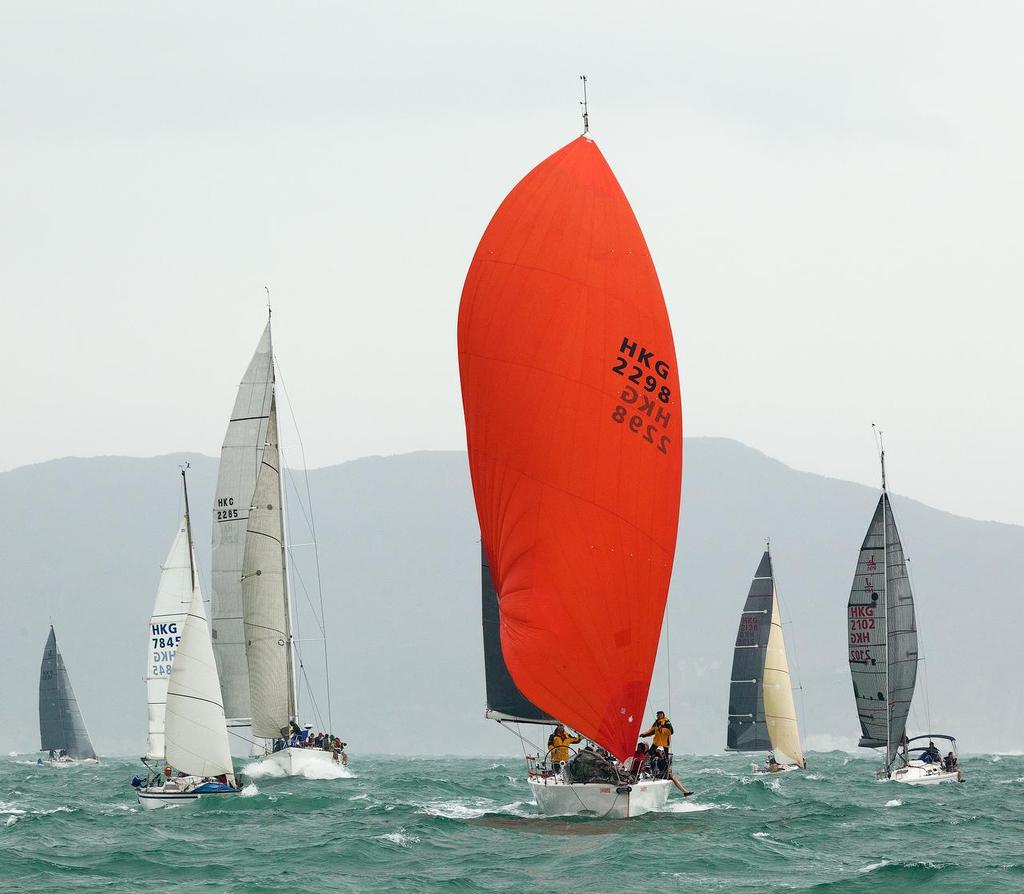 Fleet in action at the Tommy Bahama Around the Island Race 2013. photo copyright  RHKYC/Guy Nowell http://www.guynowell.com/ taken at  and featuring the  class