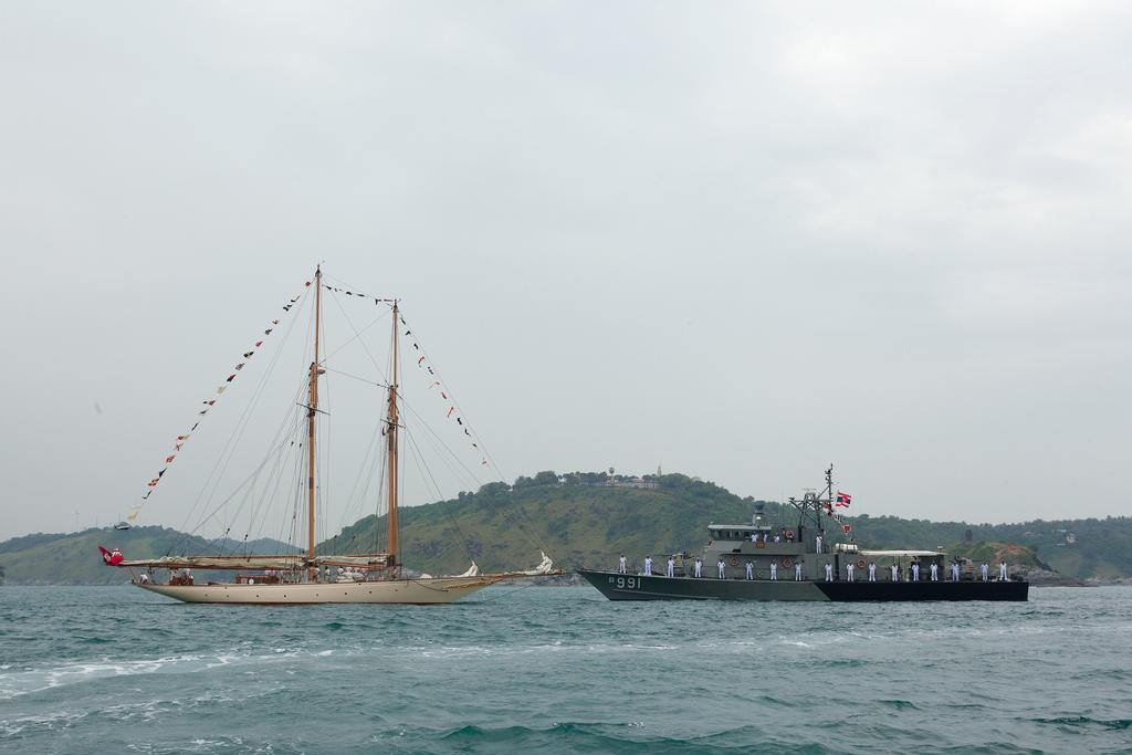 Phuket King's Cup 2013, Sail-past photo copyright Guy Nowell taken at  and featuring the  class