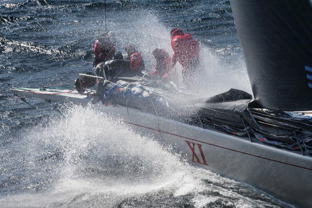 Wild Oats XI tackles the Derwent River on her way to a seventh Line Honours here off Tasman Island photo copyright  Rolex / Carlo Borlenghi http://www.carloborlenghi.net taken at  and featuring the  class