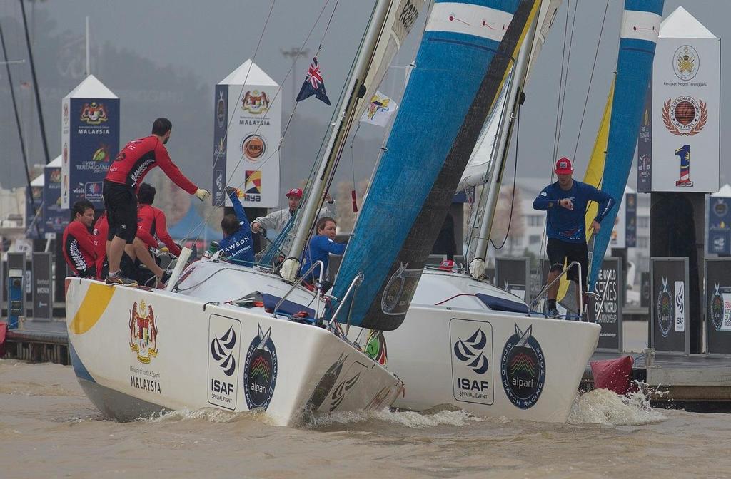 WAKA Racing and USone racing in the Semi Finals on Day 6 of the Monsoon Cup, Malaysia, the final round of the Alpari World Match Racing Tour. 

The Alpari World Match Racing Tour (AWMRT) is the leading professional sailing series featuring six World Championship events across the globe, sanctioned by the International Sailing Federation (ISAF).

This image is free for editorial use and must be credited: AMWRT/onEdition, for further free images please go to http://www.w-w-i.com/wmrt_2013/

For al photo copyright  OnEdition / WMRT http://wmrt.com/ taken at  and featuring the  class
