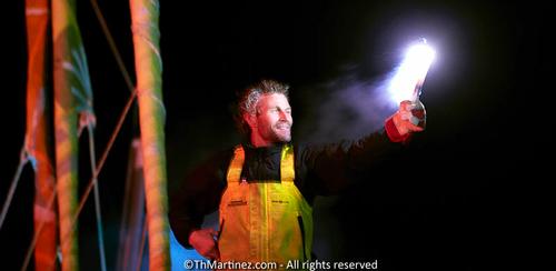  2012/13 Vendee Globe Finish. Solo round the world sailing race non stop without assistance (24840 NM). Arrival  of Bernard Stamm (SUI) 