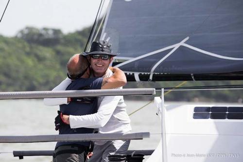 Mike Gascoyne and Brian Thompson celebrate upon arrival in Itajai ©  Jean-Marie Liot / DPPI / TJV http://www.transat-jacques-vabre.com/