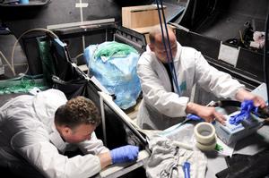 Boat builders are finalising details inside the boat – that’s the fit-out phase. Work inside the boat takes place in a very small and dark space.  - Volvo Ocean Race 2014-15 photo copyright Pedro Freitas /Volvo Ocean Race taken at  and featuring the  class