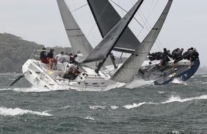 Mixing fleets; Shogun V crosses tacks with an entry in the Beneteau Cup photo copyright Dale Lorimer taken at  and featuring the  class