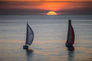 LIBERA (ITA) and EOS (GBR) sailing towards the sunset - 2013 Rolex Middle Sea Race photo copyright  Rolex/ Kurt Arrigo http://www.regattanews.com taken at  and featuring the  class
