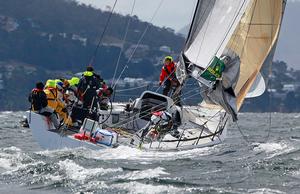 Primitive Cool - Finish line, 2013 Rolex Sydney Hobart - Day 4 photo copyright Crosbie Lorimer http://www.crosbielorimer.com taken at  and featuring the  class