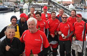 Bill Wild, Adrienne Cahalan and the crew of Wedgetail safely in Hobart after their dismaying off Tasman Island - Finish line, 2013 Rolex Sydney Hobart - Day 4 photo copyright Crosbie Lorimer http://www.crosbielorimer.com taken at  and featuring the  class