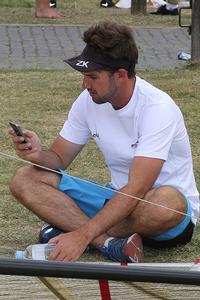 Seve Jarvin checks the weather on his phone-1 - Day 4 - 3 Buoys Challenge - Sydney Harbour November 3, 2012 photo copyright Frank Quealey /Australian 18 Footers League http://www.18footers.com.au taken at  and featuring the  class